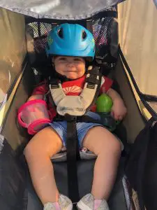 daughter in bike trailer