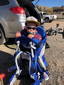 our daughter resting in child backpack carrier