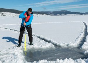 Using a Manual Ice Auger with proper stance